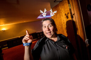 Woman wearing reindeer headband