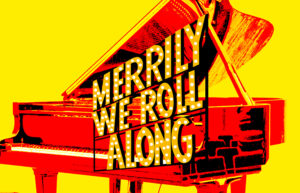 Piano with words Merrily We Roll Along in front of it.