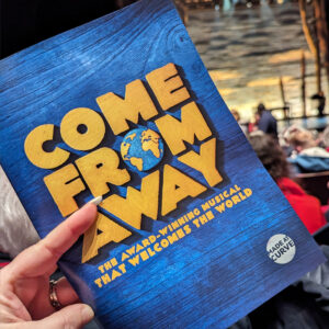 Programme cover of the musical Come From Away